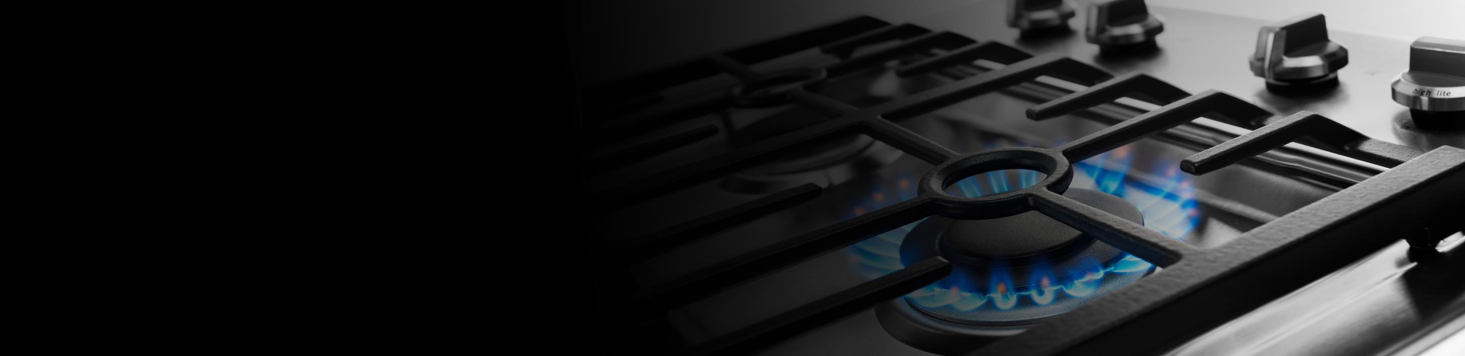 Ignited gas burner on a cooktop